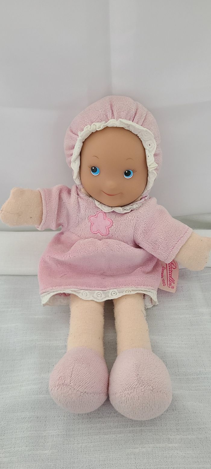 Poupée petit Collin rose fleur