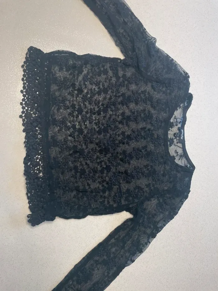 Haut dentelle transparente