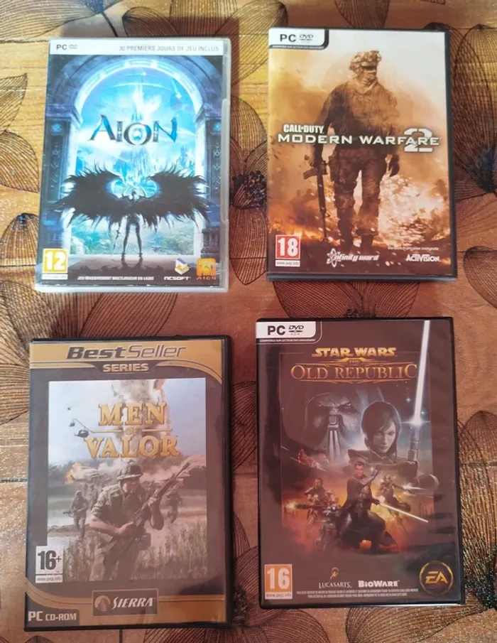 Jeux pc Aion, call of duty, men of valor, star wars