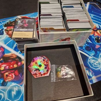 Lot lorcana plus de 900 cartes sans doubles de la commune a la super rare chap 1 a 8