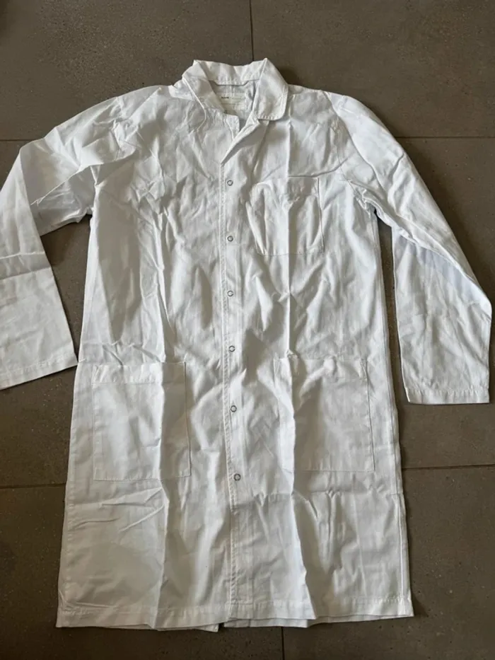 Blouse blanche taille 38, très bon état