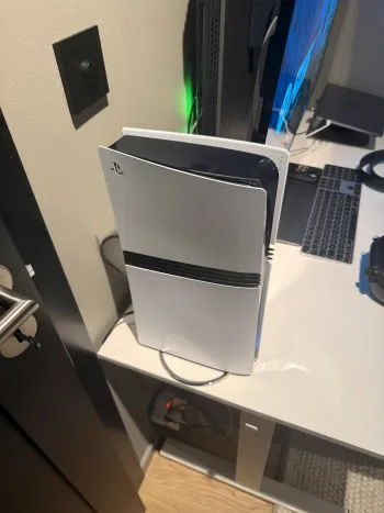 Ps5 pro avec manette et des jeux