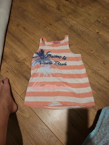 Débardeur rose et blanc NKY 12 ans bon etat