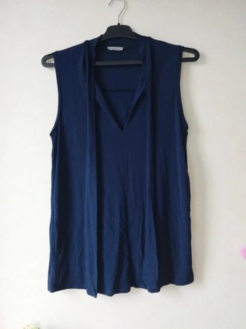 Blouse élégante sans manches