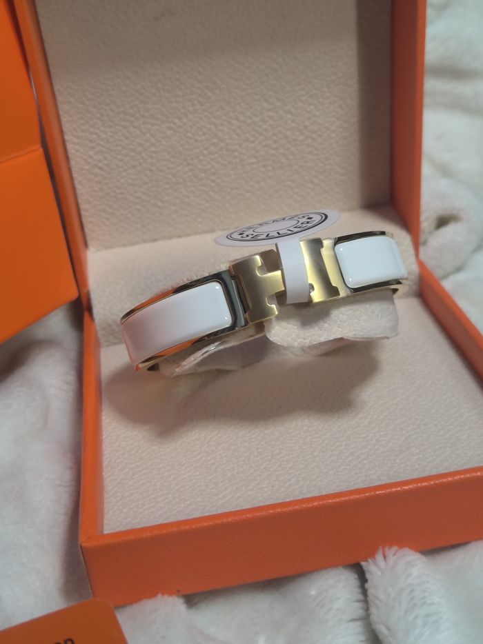 Bracelet Hermès pour femme iconique H doré et blanc en taille PM neuf - photo numéro 3