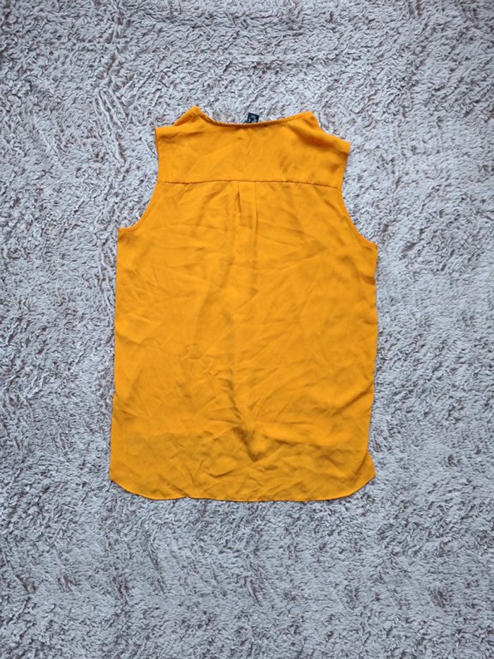 T-shirt sans manche - photo numéro 3