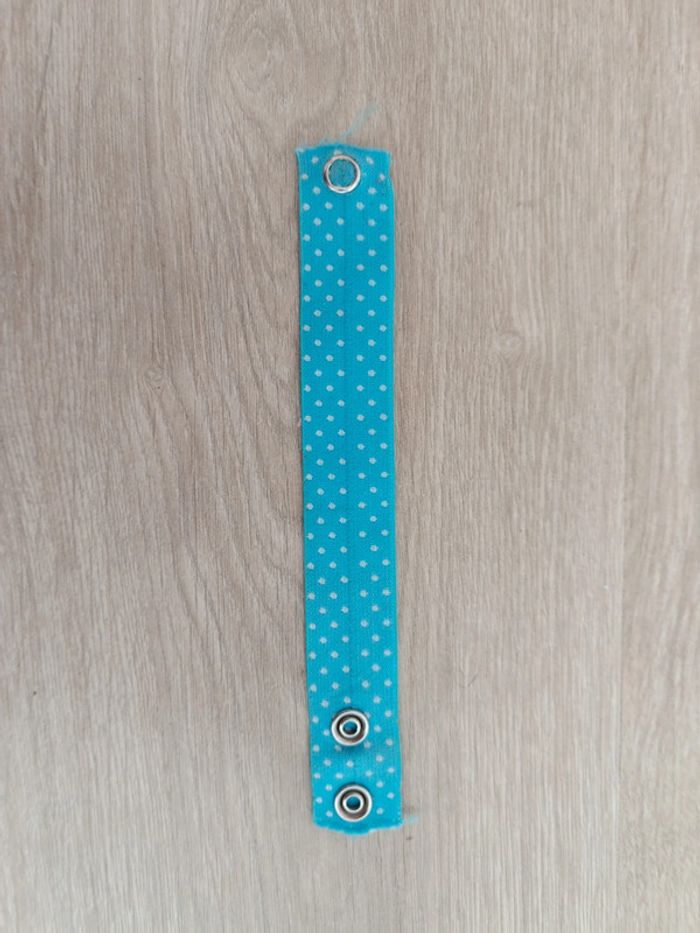 Attache masque en tissu