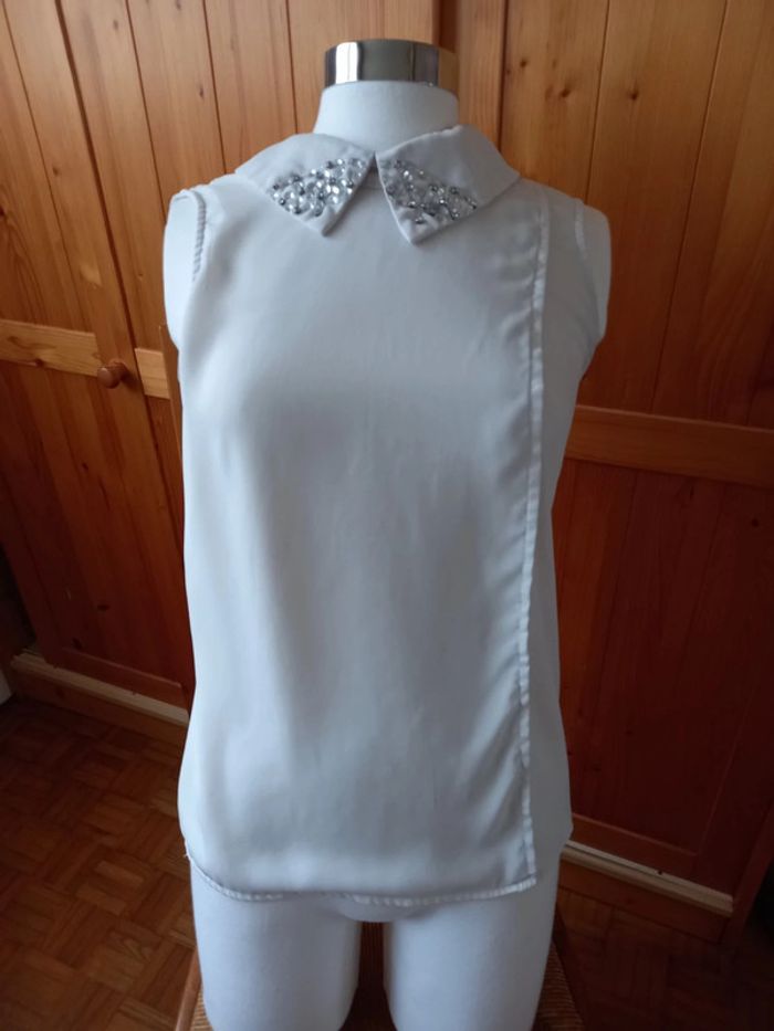 Petite blouse sans manches