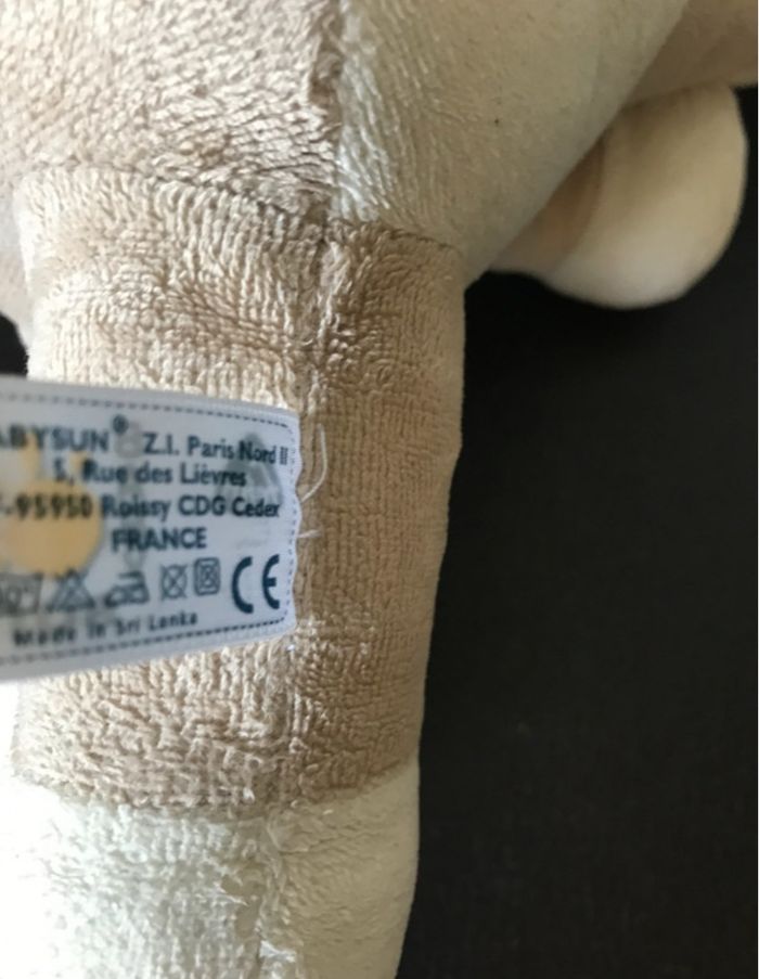 berceuse doudou girafe baby sun excellent état, passée en machine avant l’annonce beige et bleu - photo numéro 2