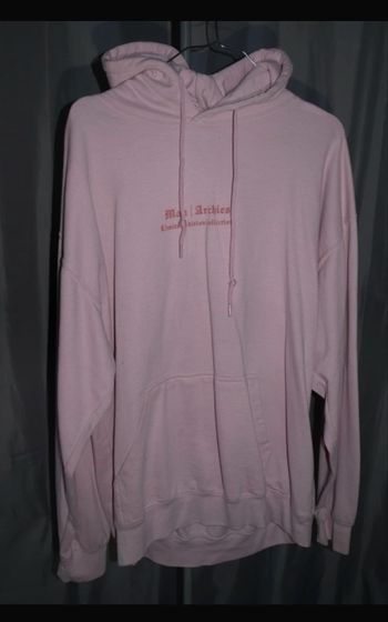 Sweat à capuche avec écriture oversize rose