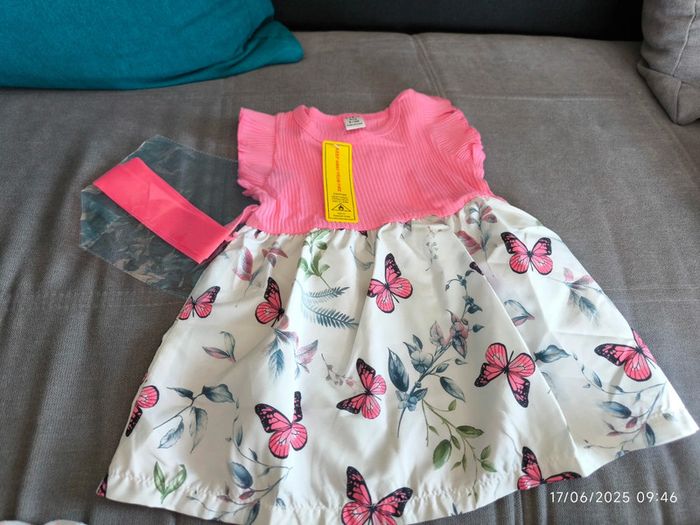 Robe neuve papillons