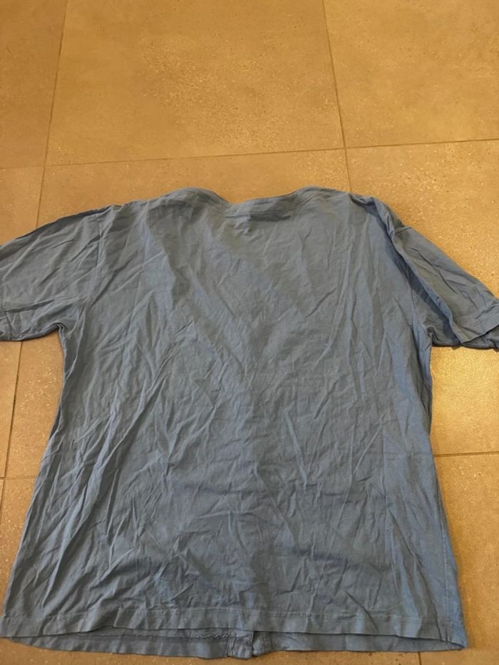 Haut bleu clair taille 52/54, très bon état - photo numéro 3