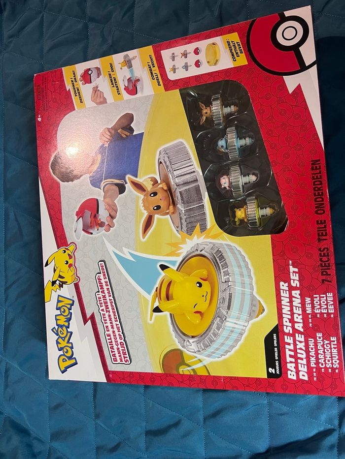 Arène Pokémon + 4 spinneurs  neuf