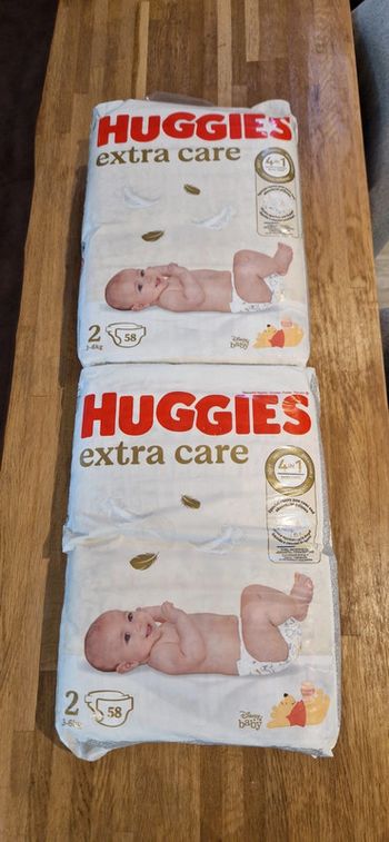 Lot de 2x58 couches taille 2 Huggies extra care neufs