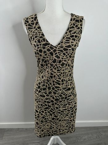 Robe chaînes noire et dorée Fille à suivre Vintage T1 36 S