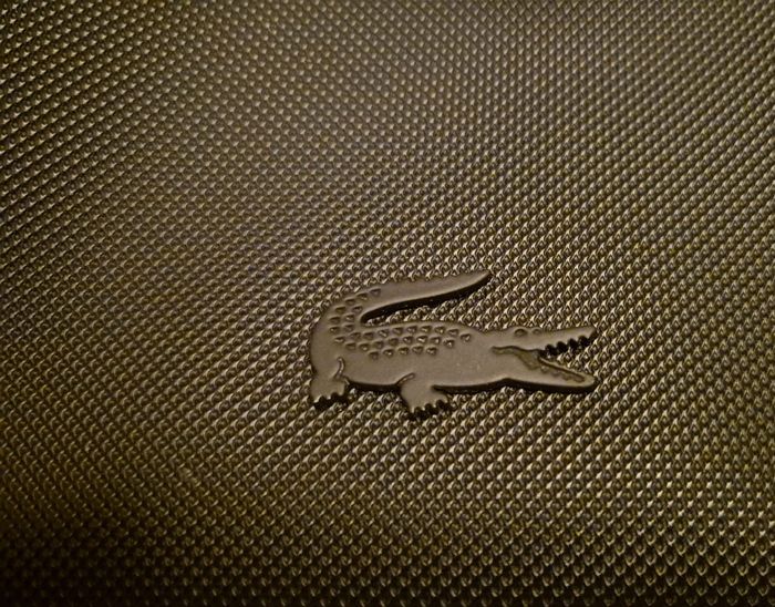 sacoche  Lacoste Noire comme neuf