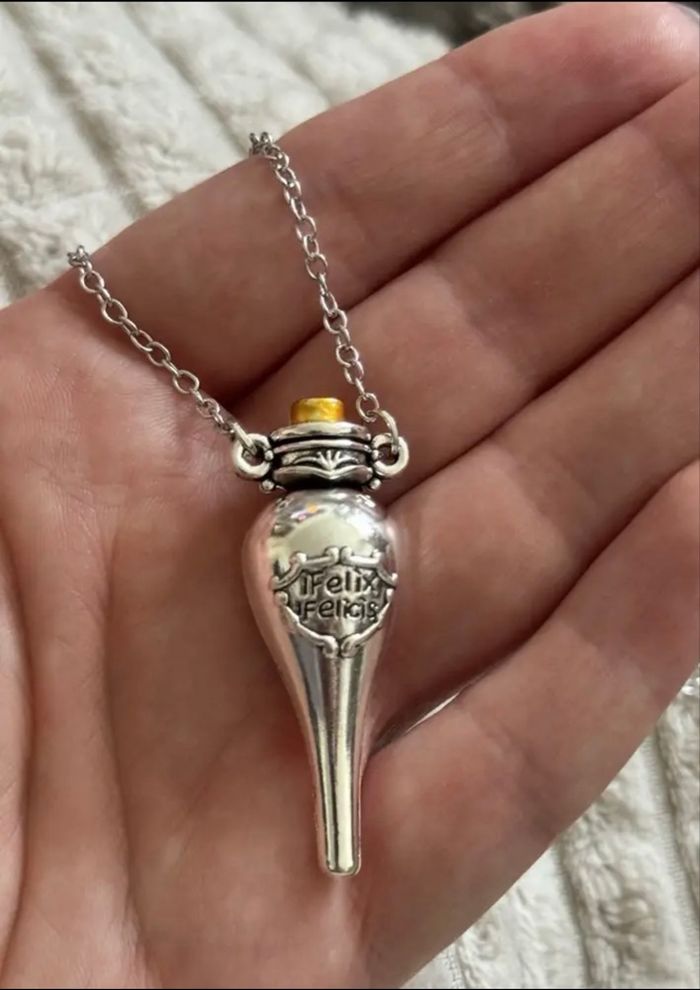 Fiole de chance liquide Neuve Harry Potter Félix Felicis couleur argenté