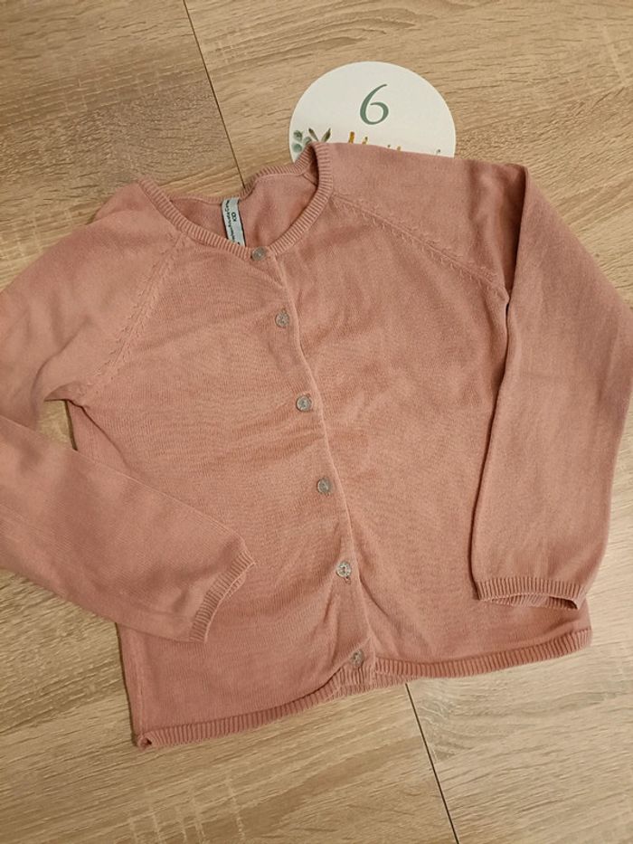 Gilet rose pâle