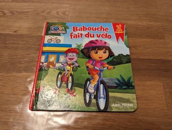 Livre Dora " Babouche fait du vélo"