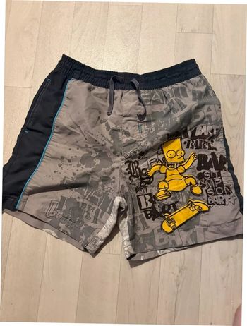 Short de plage simpsons 8 ans gris très bon état