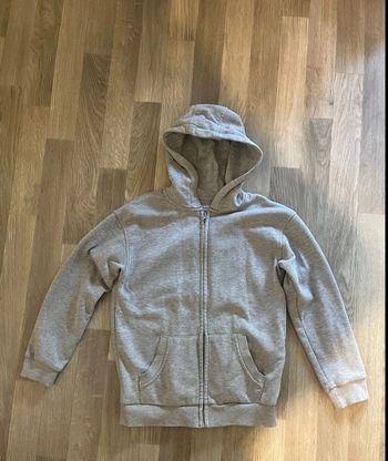 Gilet à capuche gris taille 9 / 10 ans