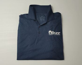 Vêtement vintage de marque Nike Dri-Fit Polo Oliver Ford Lincoln bleu foncé L #D84