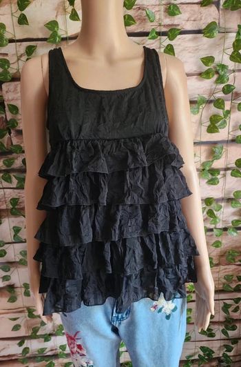 🌸Top péplum noir a volants Taille 38🌸