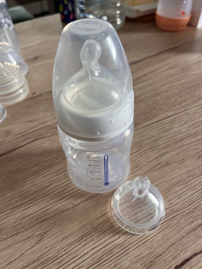 Lot de 5 biberons Nuk + tétines rechange - photo numéro 3