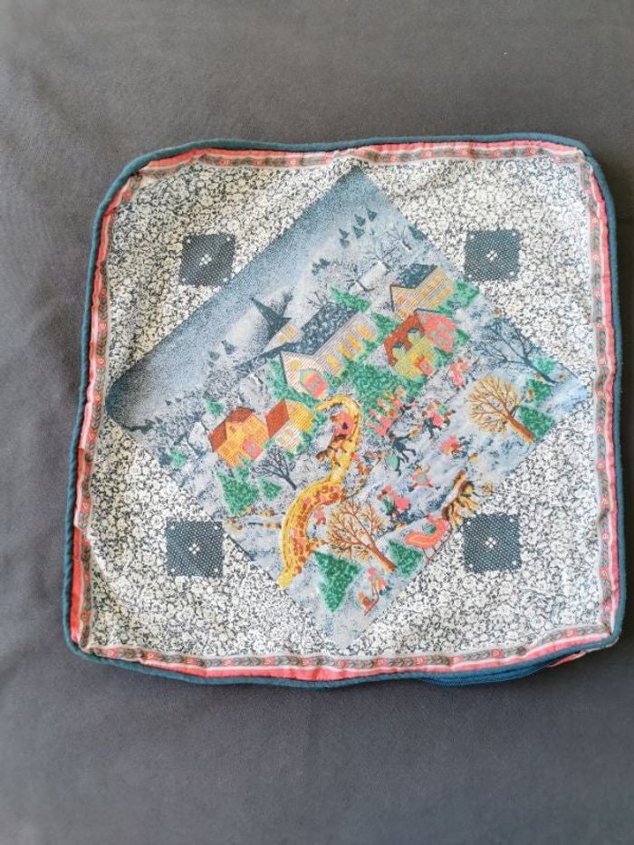 Housse de coussin décorée