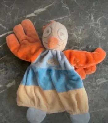 Doudou Marionnette Sissi Autruche Oiseau Noukie’s en très bon état.