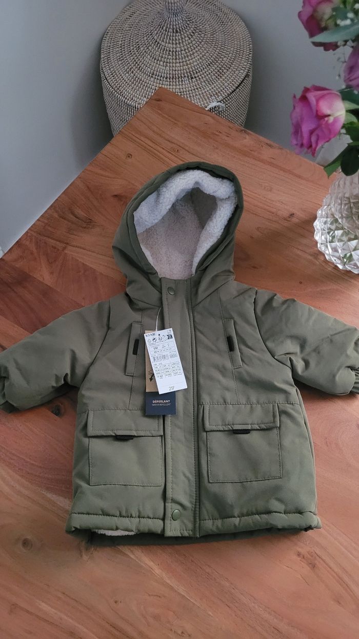 Parka chaude à capuche 6 mois neuve