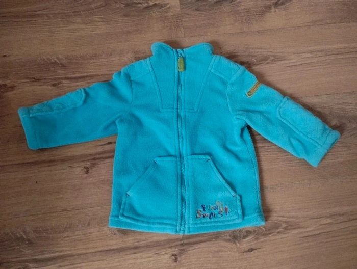 Veste polaire bleue orchestra taille 9 mois