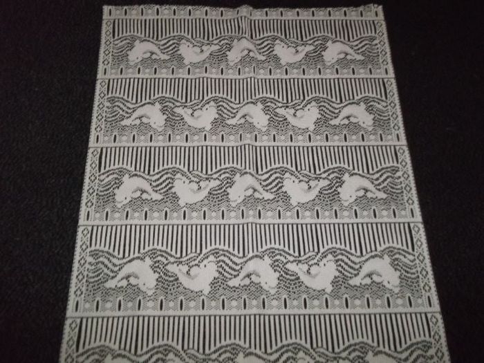 Rideau passe tringle blanc "dauphins" 65 x 148 cms TBE