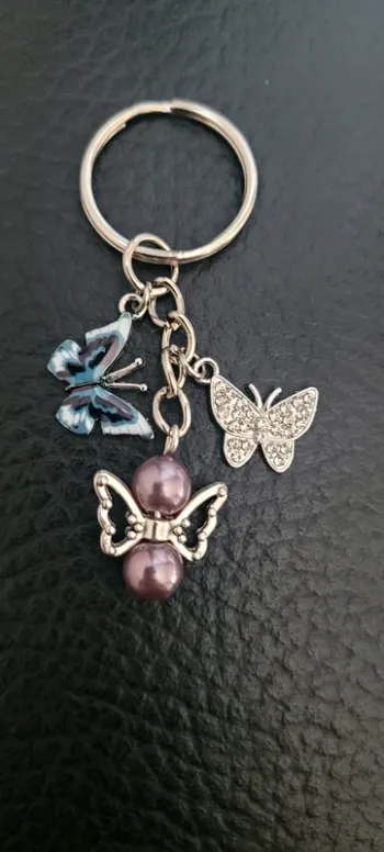 Porte-clés ange gardien papillons