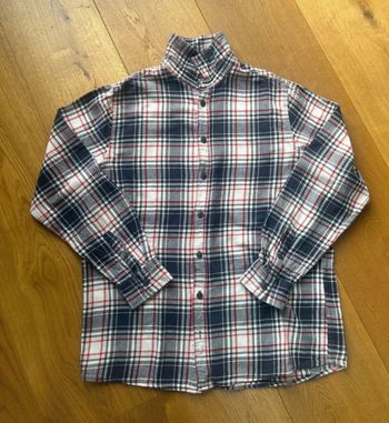 Chemise à carreaux en très bon état