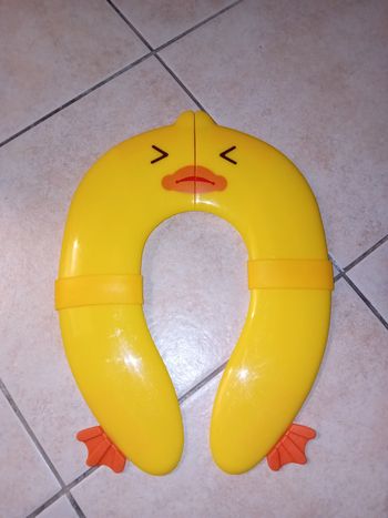 Réducteur de toilette canard