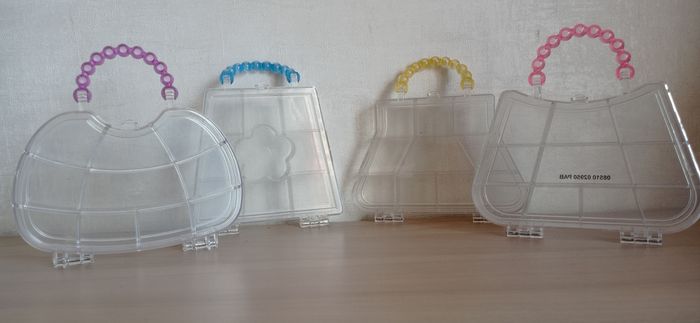 4 boites pour perles en forme de sac