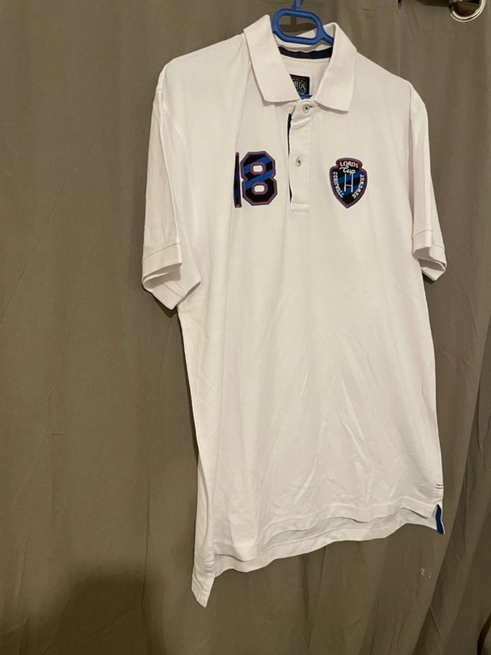 Polo à manches courtes blanc motifs écriture devant bleu marine neuf Lord of Rugby taille XXL - photo numéro 3