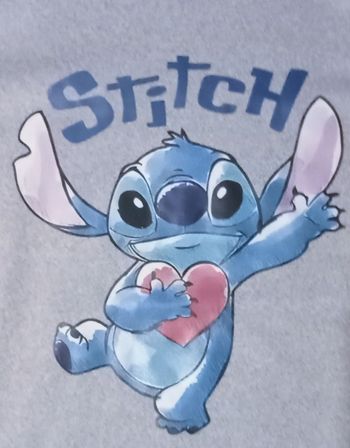 Pull polaire stitch 10 ans neuf