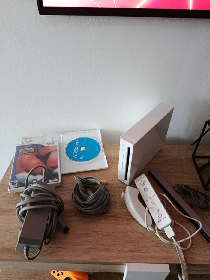Wii avec 3 jeux et câbles