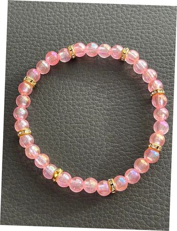 Bracelet rose et doré en perles taille unique jamais porté