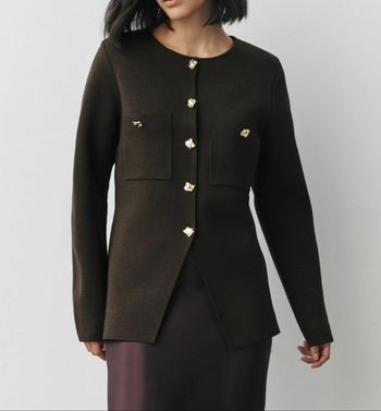 Gilet marque détails dorés next prix 60€