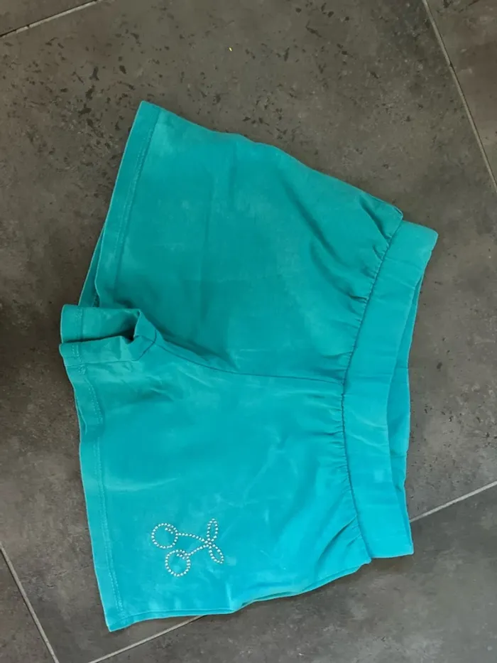 7 ans short TiSSAIA bleu/vert strass cerise