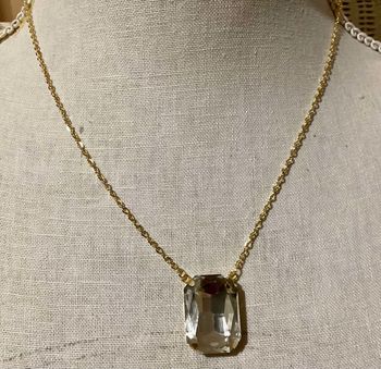 Collier réglable acier inoxydable or pavé multi facettes transparent