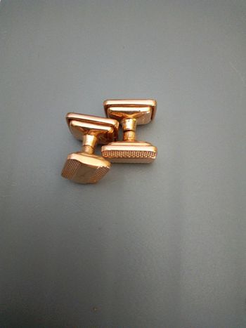 Boutons de manchette.