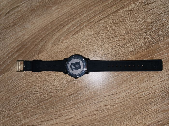 Montre lacoste noir et or - photo numéro 4