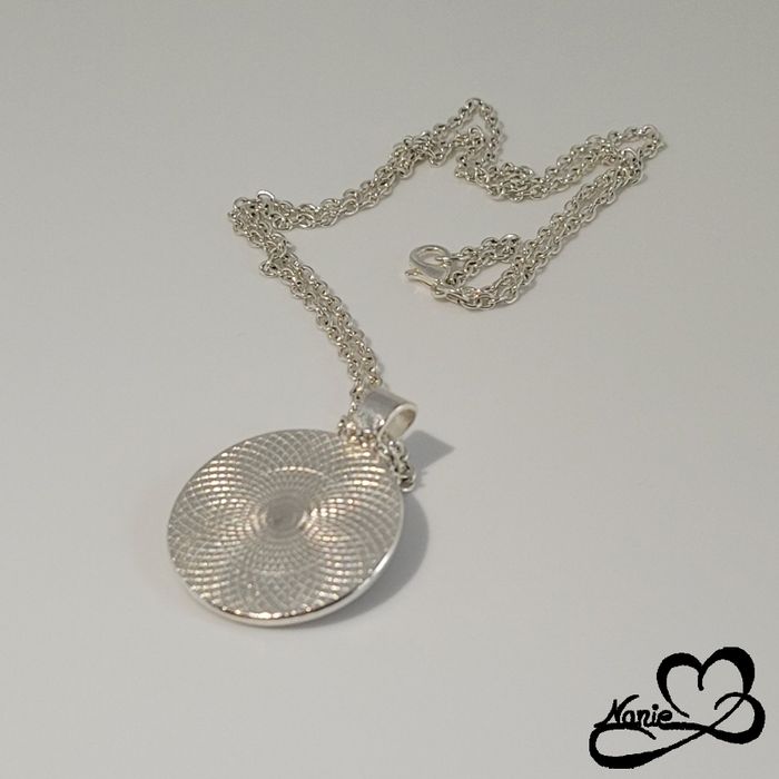 Sautoir argenté et doré avec un cœur - photo numéro 4