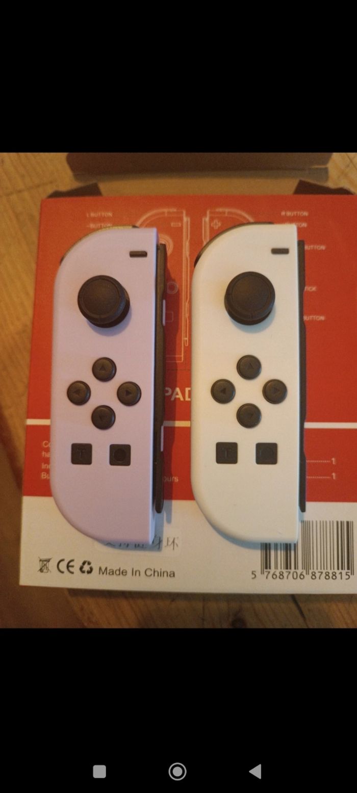 Joycon gauche rose blanc