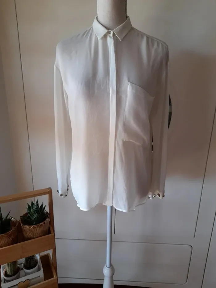 Camisa con detalles puños - photo numéro 2