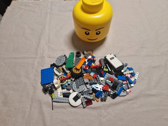 Tête de rangement lego + 300g lego vrac